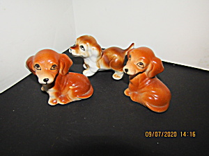 Three Vintage Hound Puppies Figurines