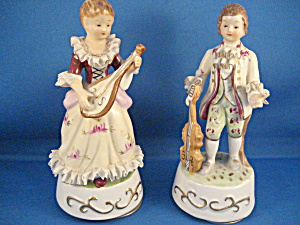 Two Colonial Musical Figurines