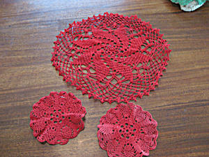 Three Red Doilies